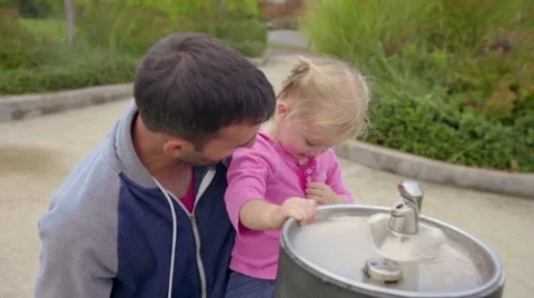 Toddler does not want to dry off, she wants more water Stock Footage 58490982