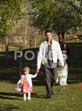 Toddler on easter egg hunt Stock Photos