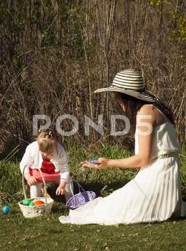 Toddler on easter egg hunt Stock Photos