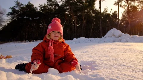 Toddler Eats Snow Video stock 101746534
