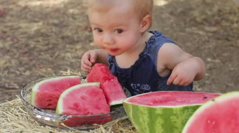 Toddler eats watermelon smile Stock-Footage 12451821