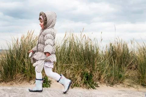 Toddler exploring beach Stock Photos