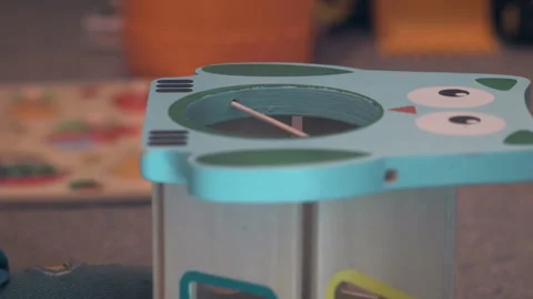Toddler Hand Putting Several Blocks Into Shape Sorter Video stock 329370280