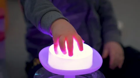 Toddler Hand Taking Off Glowing Top From Mushroom Night Lamp In Dark Room Stock Footage 330192431