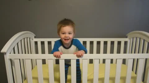 Toddler jumping in crib 7521 스톡 동영상 10737093