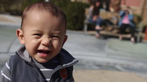 Toddler laughing at camera Stock Footage 37618632