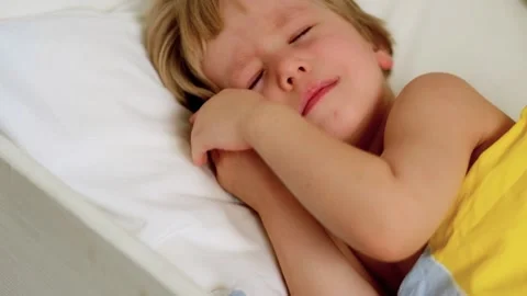 Toddler Lying in the Bed and Going to Sleep Stock Footage 87750396