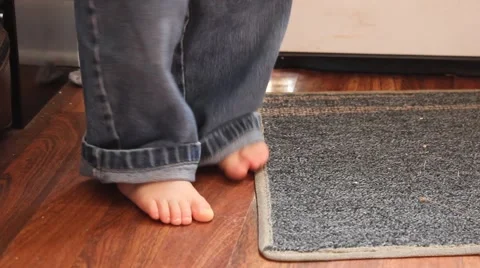 Toddler playing with front door Stock Footage 44445602