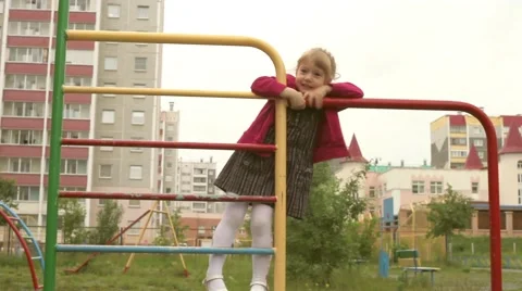 Toddler playing on playground Stock Footage 41630715