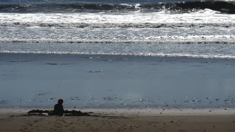 Toddler playing in sand Stock Footage 126669660