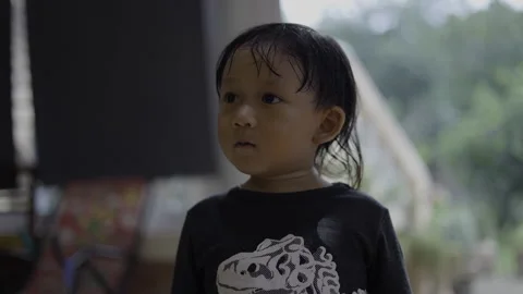 Toddler Standing And Looking At Something Intently Stock Footage 337356304