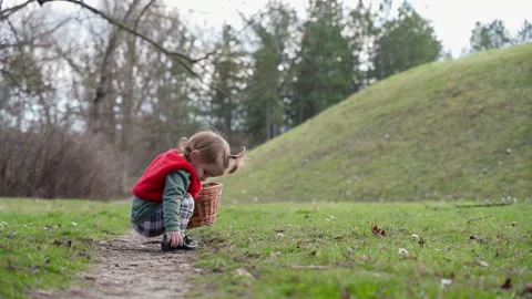 Toddler Standing on Park Path with Wicker Basket in Serbia Stock Footage 331123458