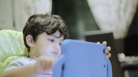 Toddler touching his tablet Stock Footage 59104141