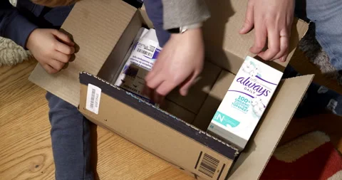 Toddler Unboxes Amazon Prime Delivery Box Stock Footage 312177699