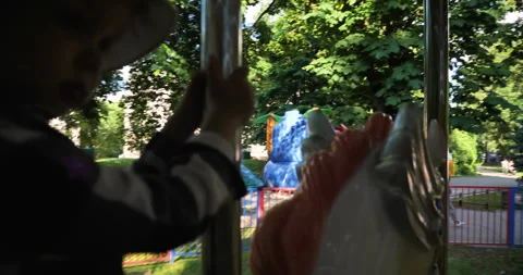 Toddler's Carousel Ride Stock Footage 277360236
