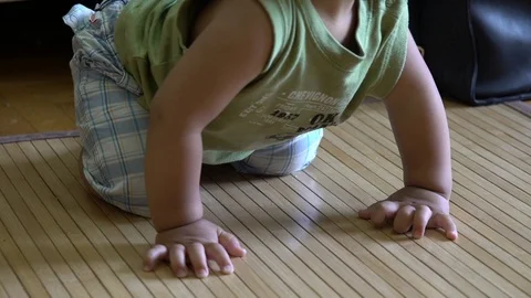 Toddler's feet while crawling Stock Footage 113348503