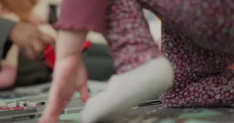 Toddlers playing with toy train in crche Stock Footage 310697269