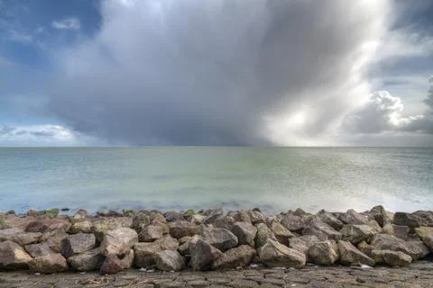 Toe protection of a solid sea dike Stock Photos