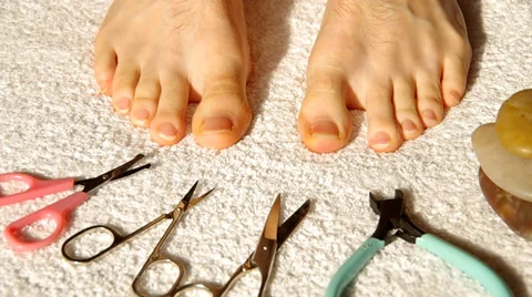 Toenails and scissors Stock Footage 35628635