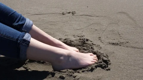 Toes in the sand Stock Footage 75351389