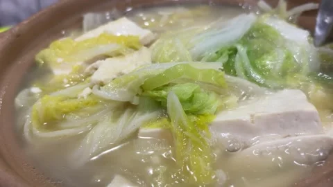 Tofu Cabbage Clay Pot Hot Pot Boiling with Steam Stock Footage 332259713