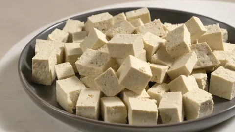 Tofu chunks closeup. Plant based diet. Vegan protein source Stock Footage 170258826