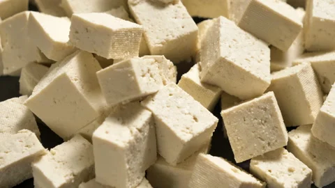 Tofu chunks closeup. Plant based diet. Vegan protein source Stock Footage 170260845