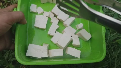 Tofu in a plastic pan Video stock 271091936