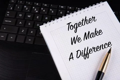 Together We Make A Difference - written on a notebook with a pen. Stock Photos