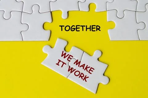 Together We Make It Work text on missing jigsaw puzzle representing teamwor.. Foto stock