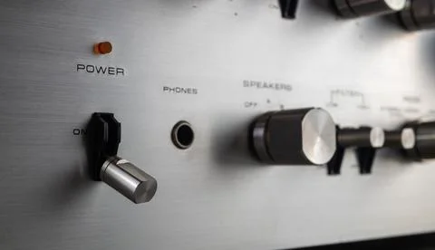 Toggle switch to position on and off. Closeup. Shallow depth of field Stock Photos