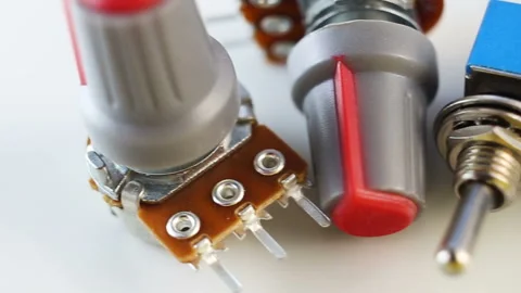 Toggle switches (on-off toggle switch) and variable potentiometers (resistors) a Stock Footage 129637945