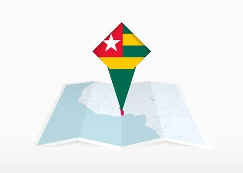 Togo is depicted on a folded paper map and pinned location marker with flag.. Stock Illustration