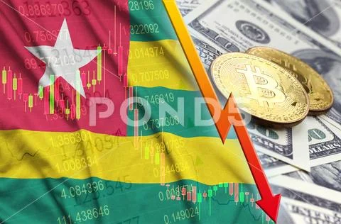 Togo flag and cryptocurrency falling trend with two bitcoins on dollar bills Stock Photos