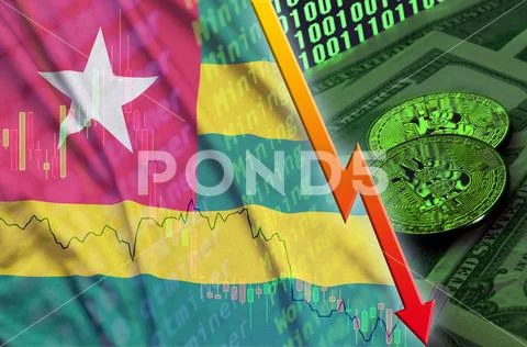 Togo flag and cryptocurrency falling trend with two bitcoins on dollar bills Stock Photos
