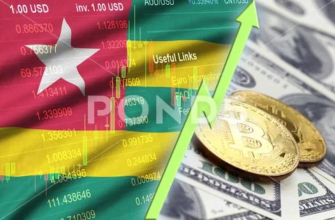 Togo flag and cryptocurrency growing trend with two bitcoins on dollar bills Stock Photos