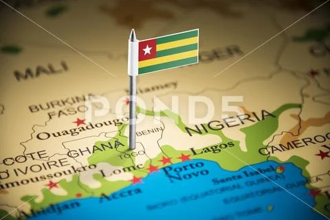 Togo marked with a flag on the map Stock Photos