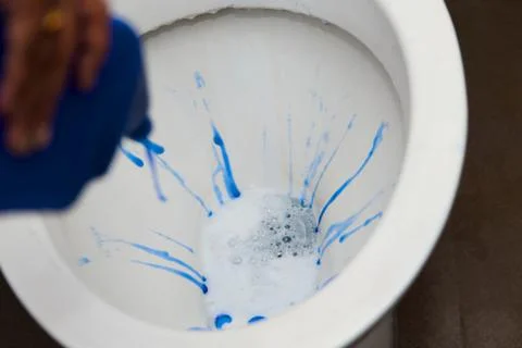 Toilet Cleaning in Progress Stock Photos