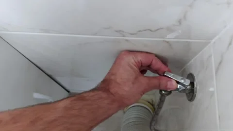Toilet Flush Triggered: Hand Opens Valve with Clean Precision Video stock 312377551