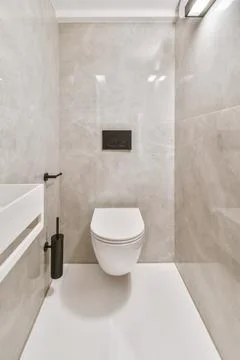 Toilet in light modern bathroom Stock Photos