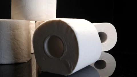 Toilet paper stack on a spinning table close up Stock Footage 155130070