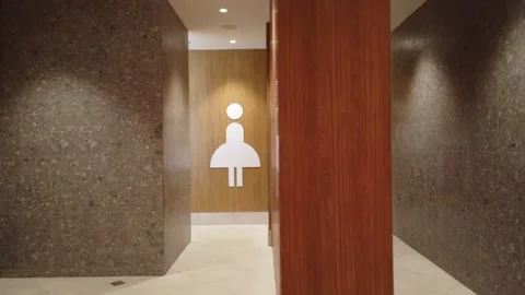 Toilet sign. A visitor to a modern shopp... | Stock Video | Pond5