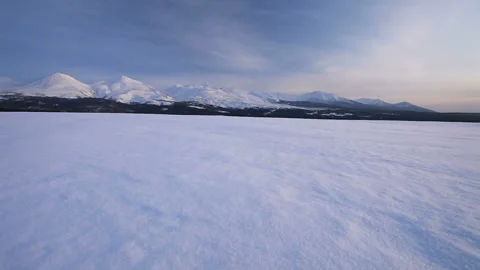 Tokachi Mountain Range, Sunset, and Snowfield Video stock 324964506