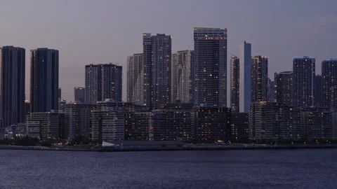 Tokyo Bay Area and High-Rise Apartments at Night in Tokyo, Japan Vídeo Stock 344023402