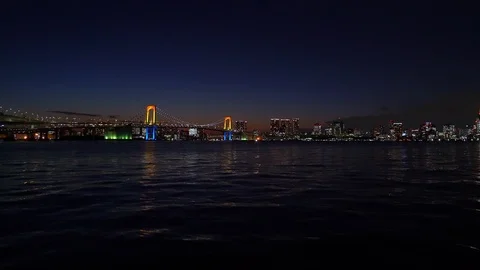 Tokyo bay at dusk / Rainbow Bridge Stock Footage