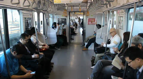 TOKYO - CIRCA MARCH 2013: Interior of a Tokyo subway car Stock Footage 22663959