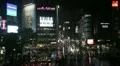 Tokyo City Busy Street Neon Signs Rain Crowded Road Night Cars Traffic Commuters HD Footage