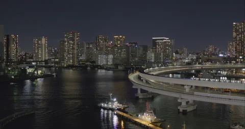 Tokyo cityscape night scene - Loop bridge traffic. Zoom-in Stock Footage 166327114