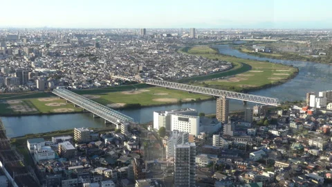 Tokyo cityscape view from elevator during going up from building Stock Footage 294743616