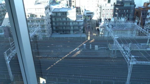 Tokyo cityscape view from elevator during going up from building Stock Footage 294762055